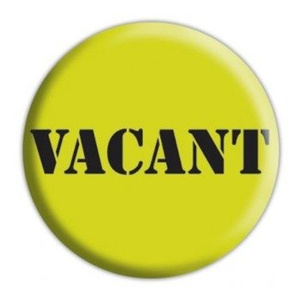 przypinka VACANT